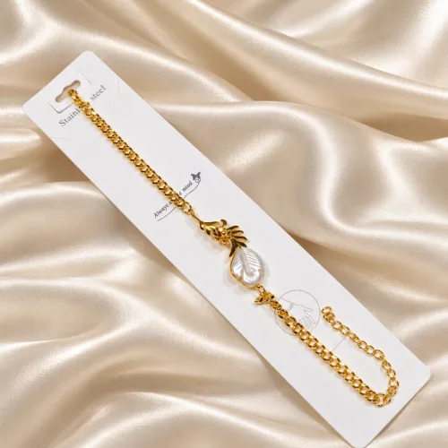 18k gold coloured stainless steel Feather style bracelet